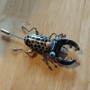 Whimsical Beetle pin by Cynthia Chuang